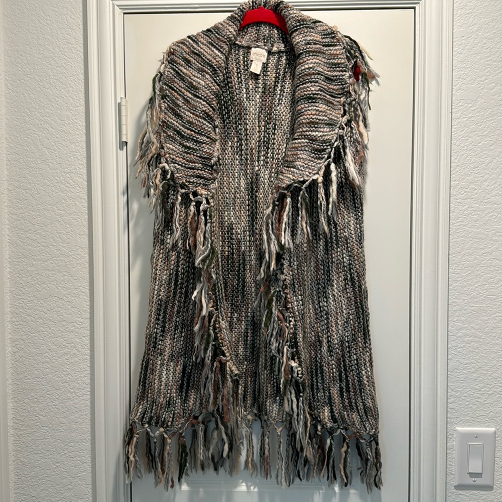 Beautiful Chicos size one open shore collar sweater vest comes below the knee